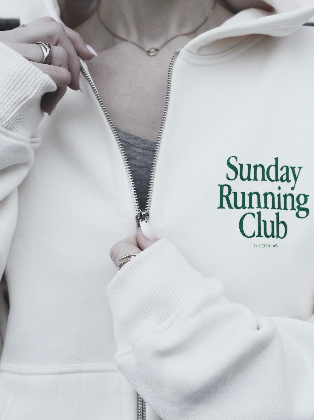 "Running Club" zip-up hoodie