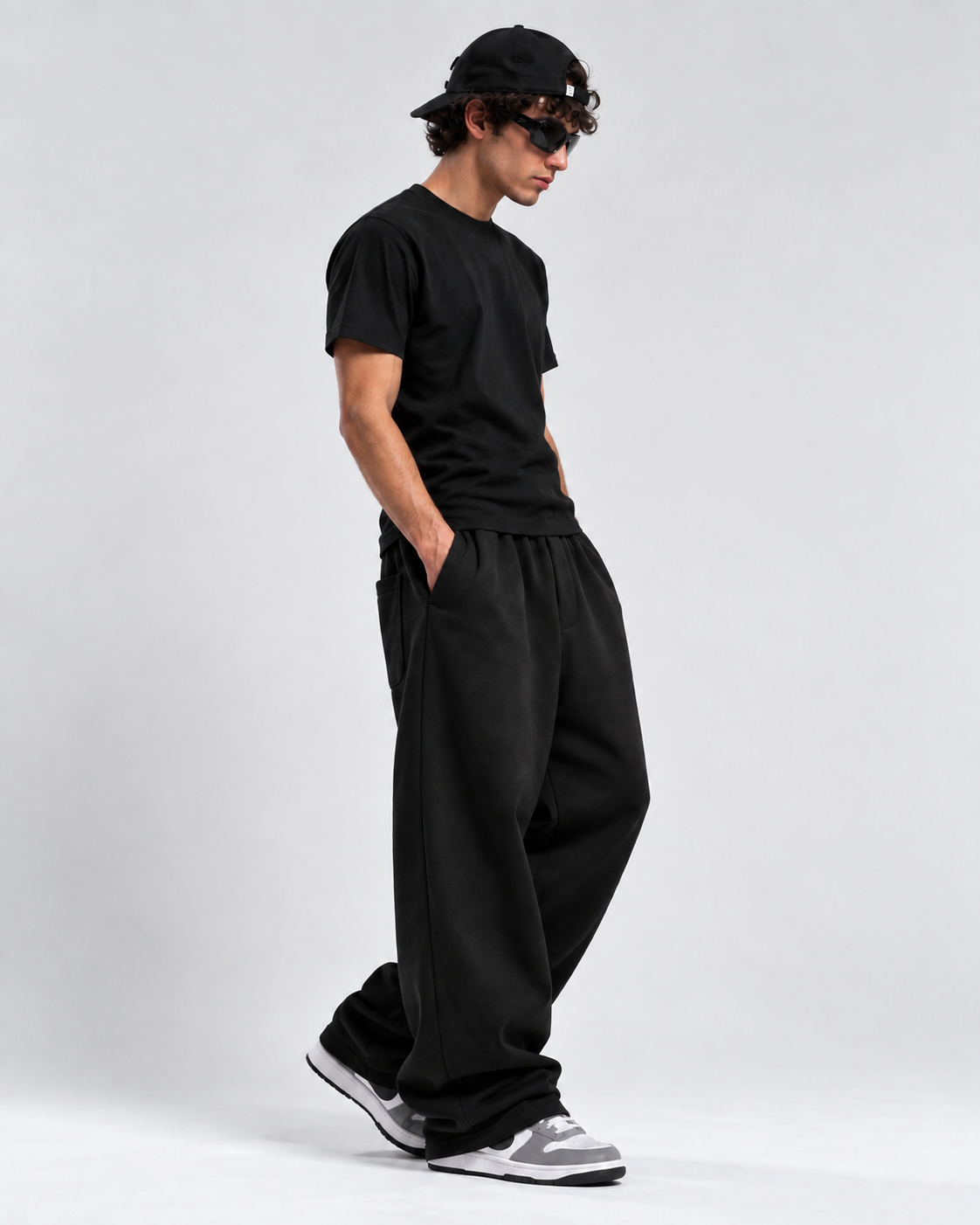 "Black relaxed uncuffed" sweatpants