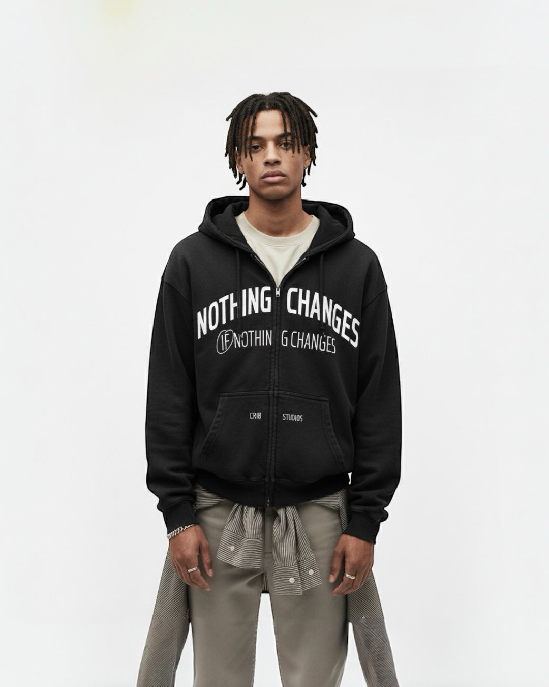 "Nothing changes" zip-up hoodie